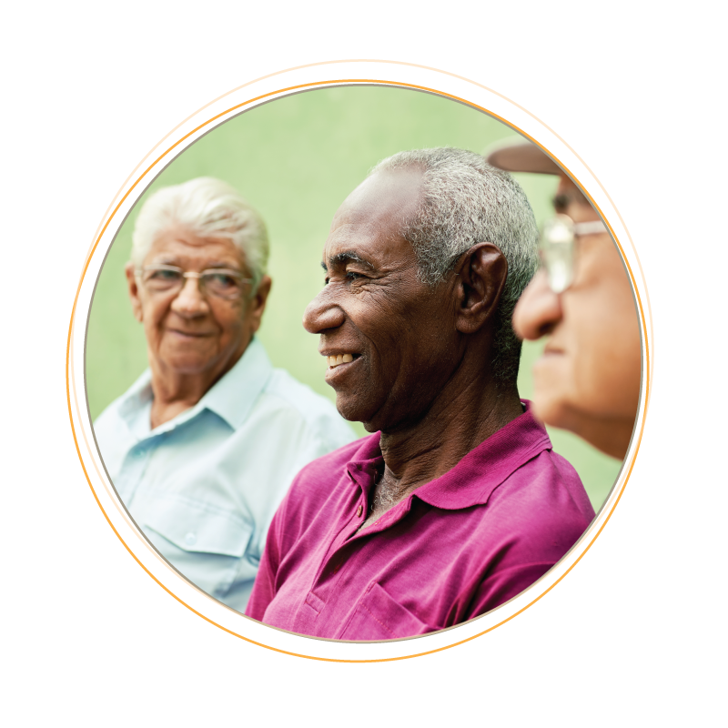 Home-Button-3 Three senior men sitting together and smiling